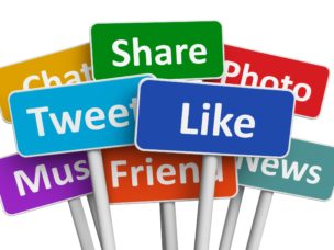 different color signs that say "share, like, photo, news, friend, tweet, music, chat"